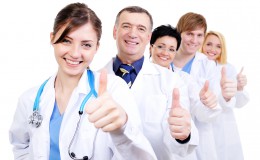 Medical doctors giving thumbs-up